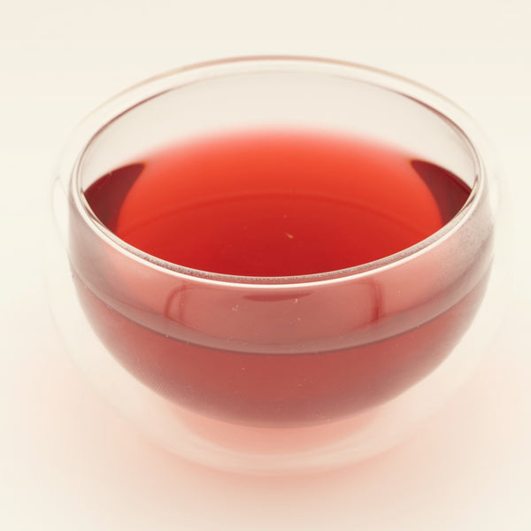 Blush Petal Soirée, brewed, in a clear glass [blush-petal-soiree-03-liquor]