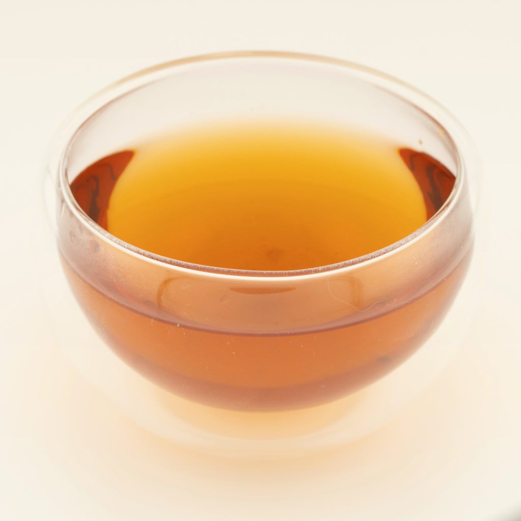 Caramel Velvet Pu'er, brewed, in a clear glass [caramel-velvet-puer-03-liquor]