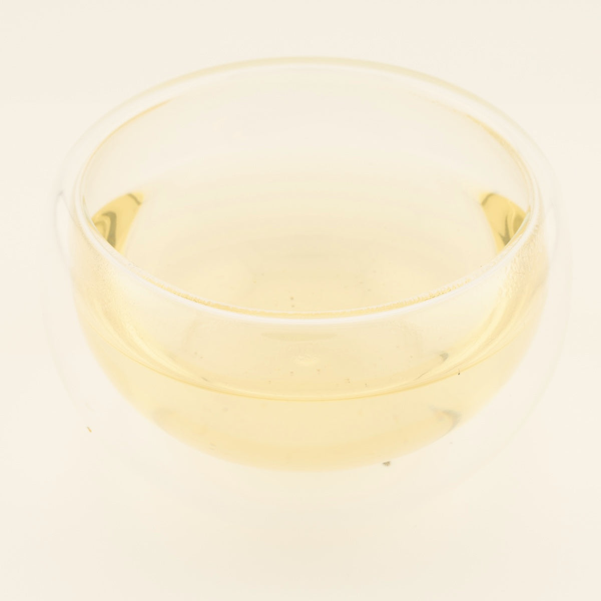 Dragon Well Green Tea, brewed, in a clear glass [dragon-well-green-tea-03-liquor]