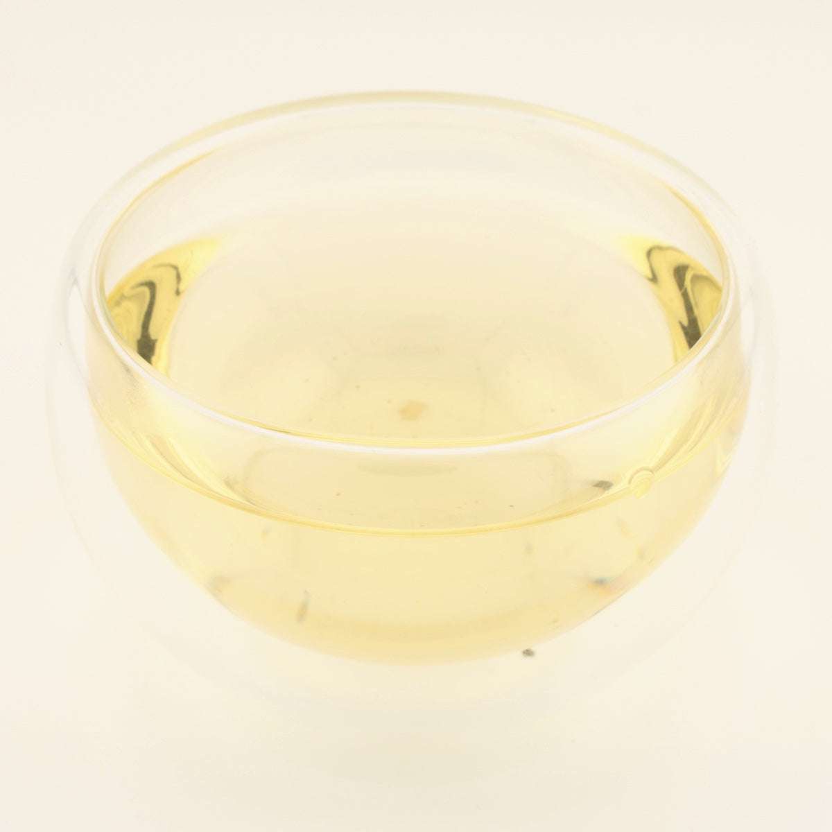 Early Spring Anji Baicha Green Tea, brewed, in a clear glass [early-spring-anji-baicha-green-tea-03-liquor]