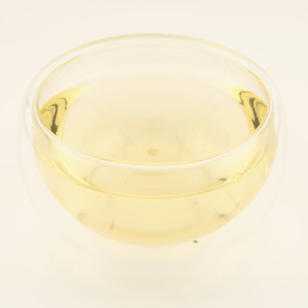 Early Spring Anji Baicha Green Tea, brewed, in a clear glass [early-spring-anji-baicha-green-tea-03-liquor]