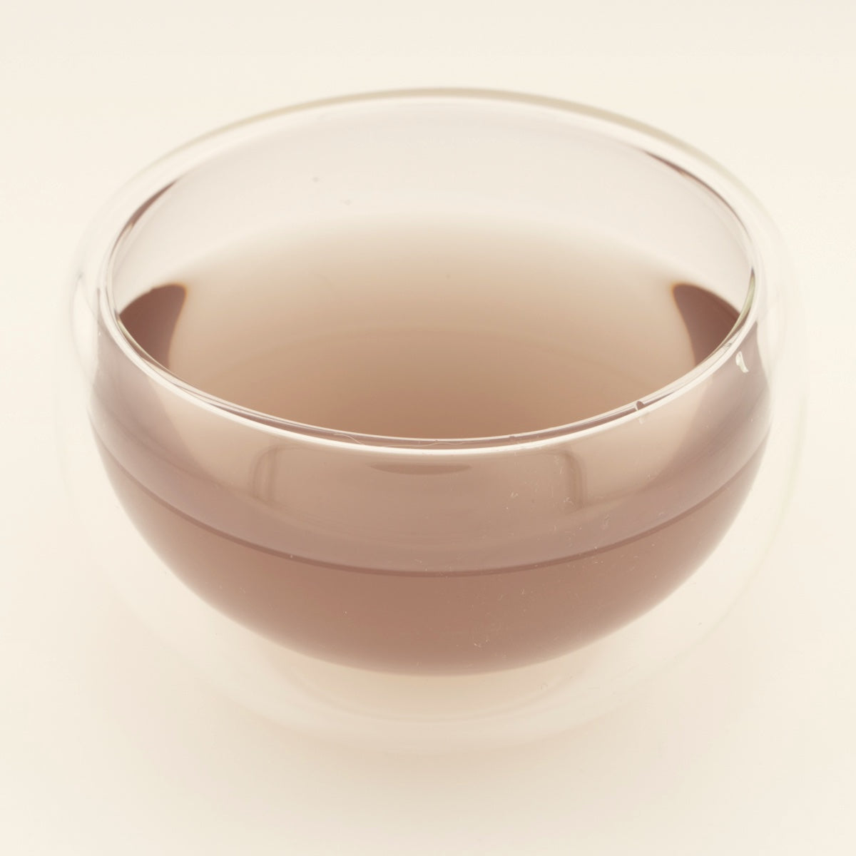 Glow Tonic, brewed, in a clear glass [glow-tonic-03-liquor]