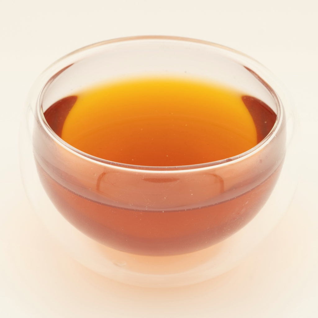 Jujube Rest and Restore Ritual, brewed, in a clear glass [jujube-rest-and-restore-ritual-03-liquor]