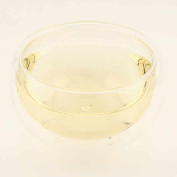 Yunnan White Bud Pu'er Tea, brewed, in a clear glass [yunnan-white-bud-puer-tea-03-liquor]